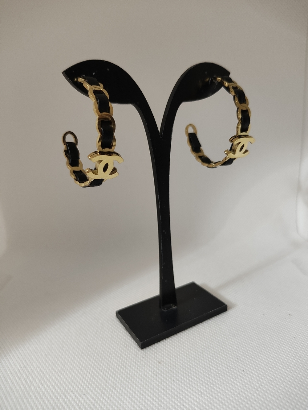 Gold And Black Leather Interwoven Hoop Earrings